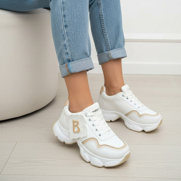 A trendy athletic-style sneaker featuring L-1103